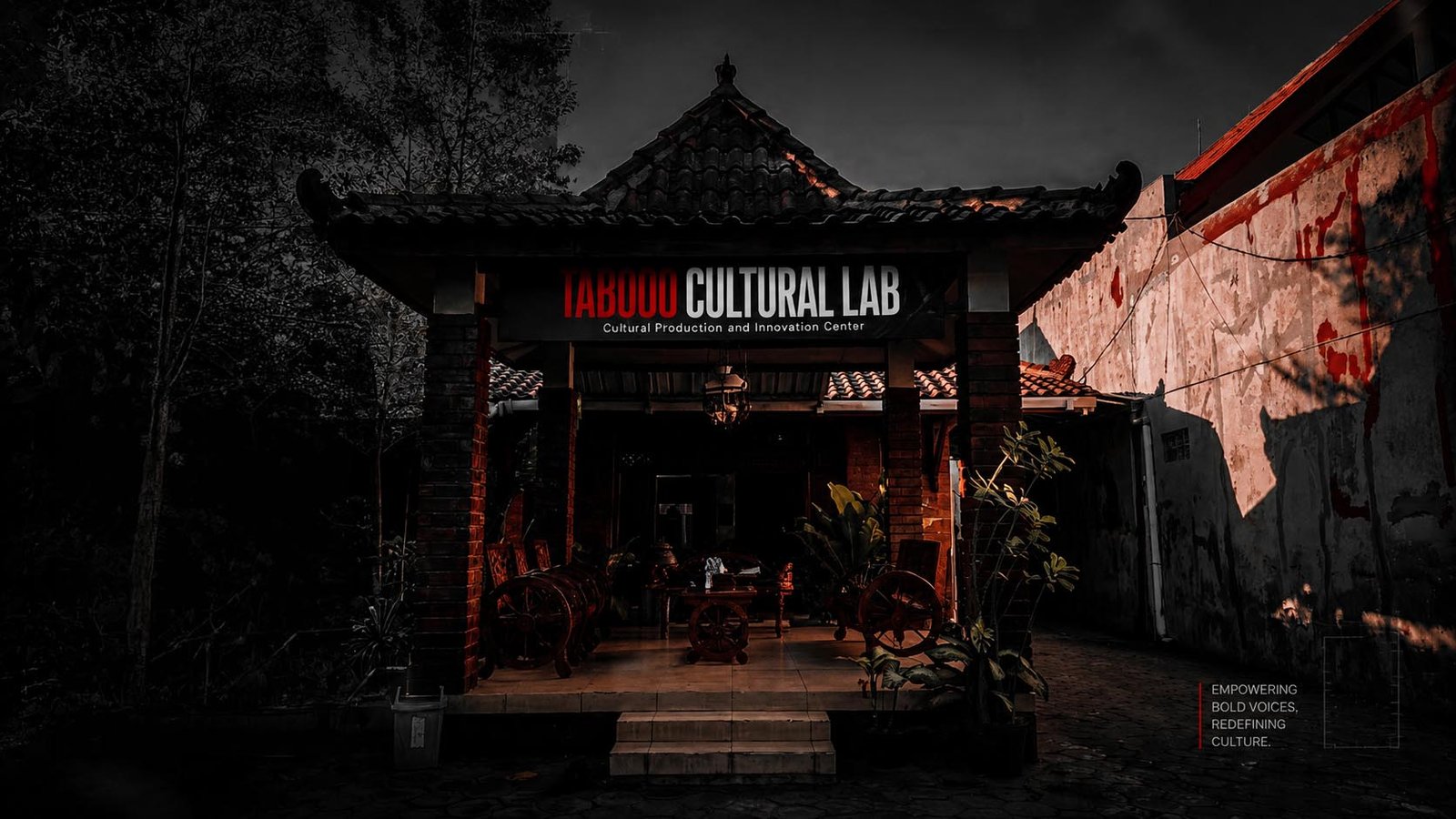 Entrance to Taboo Cultural Lab, a cultural production and innovation center, with a red-accent sign under a traditional tiled gateway.
